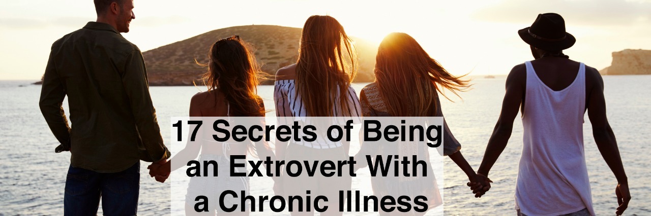 Rear View Of Friends Standing On Cliff Watching Sunset with text 17 secrets of being an extrovert with a chronic illness