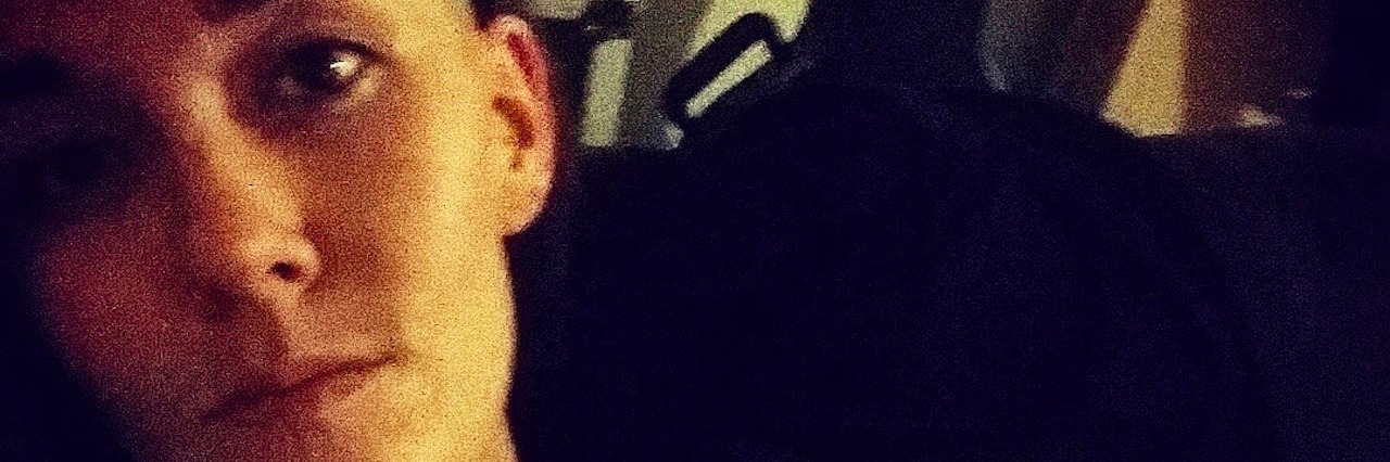 13 Photos That Show What Fibromyalgia Really Looks Like woman wearing black tank top