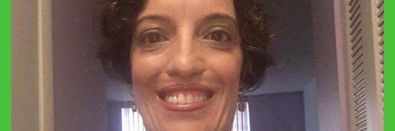 Why Cerebral Palsy Awareness Matters Nicole Luongo wearing her green and black cerebral palsy awareness t-shirt.