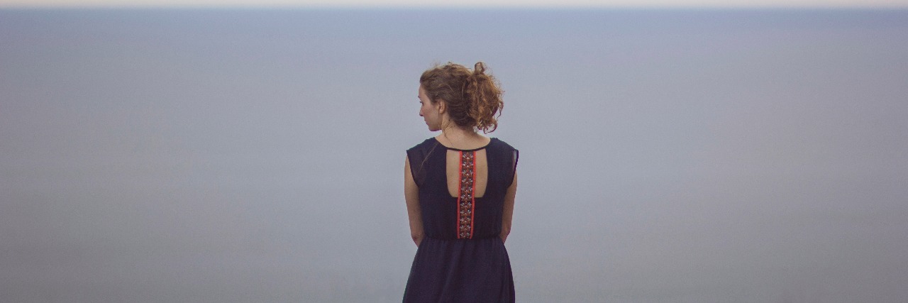 Finding Purpose, Fulfillment and Meaning in Life With Cystic Fibrosis woman staring at the ocean