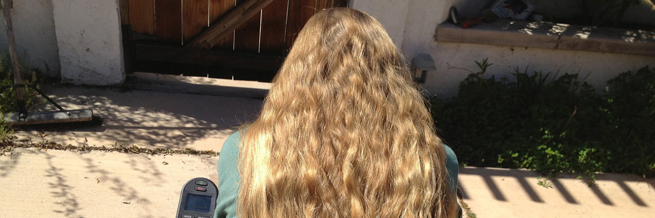 'My Body, My Choice' as a Woman With a Disability Karin, a woman in a wheelchair with long reddish-blonde hair.