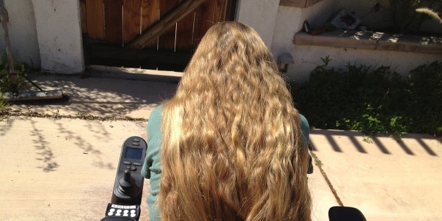 What 'My Body, My Choice' Means to Me as a Woman With a Disability Karin, a woman in a wheelchair with long reddish-blonde hair.