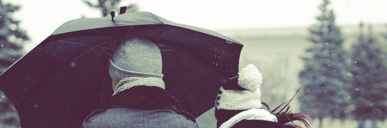 To the Significant Other Frustrated With Your Partner's Depression couple under an umbrella