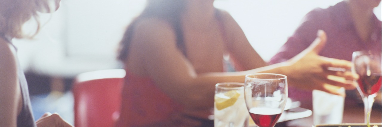 How to Have a No-Stress Dinner Party When You Have Anxiety Three Women Talking over Dinner