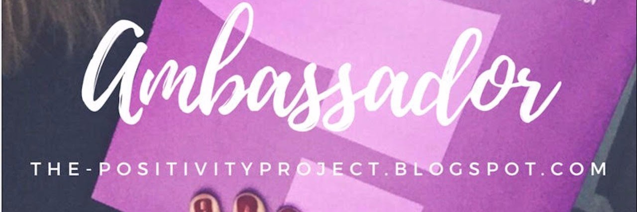 Becoming a Lupus Foundation of America Ambassador girl holding purple lupus pamphlet