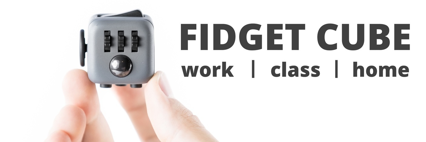 fidget cube resting on person's hands