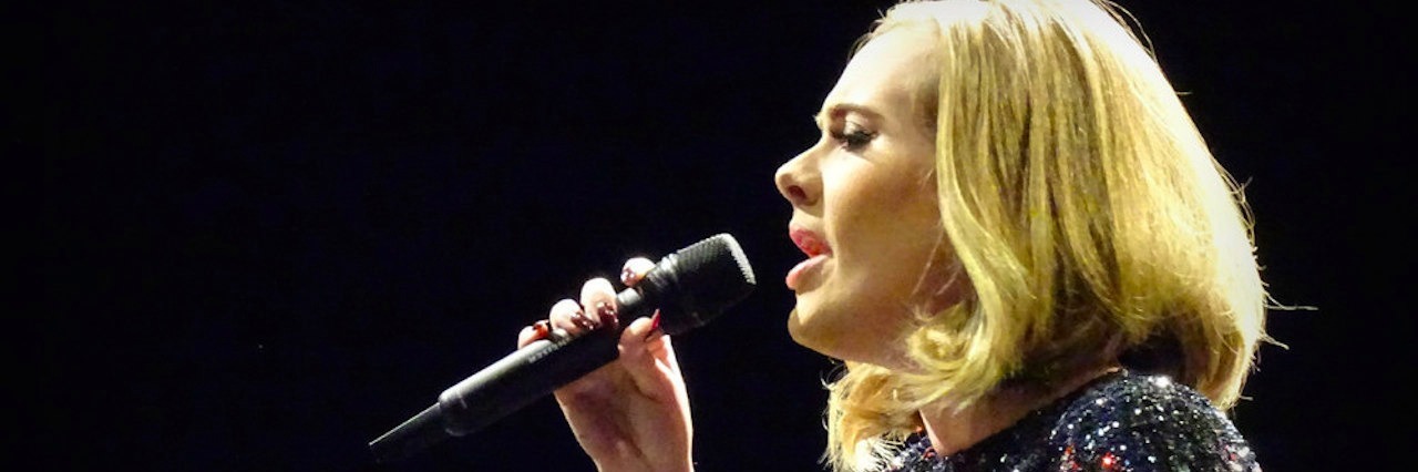 How Adele's 'Chasing Pavements' Describes Life With Arthritis adele at concert