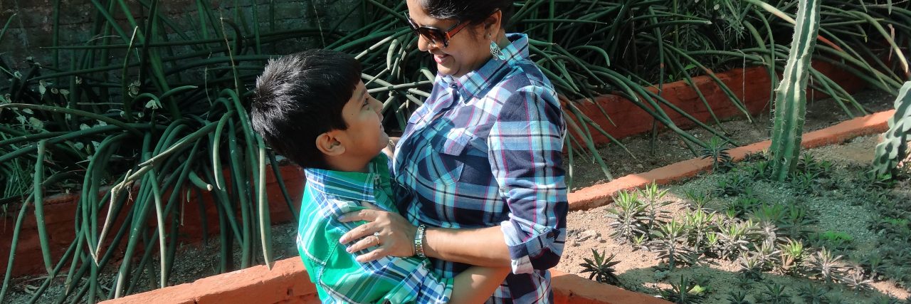 8 Mistakes I Made as a Mom of an Autistic Child mom hugging son