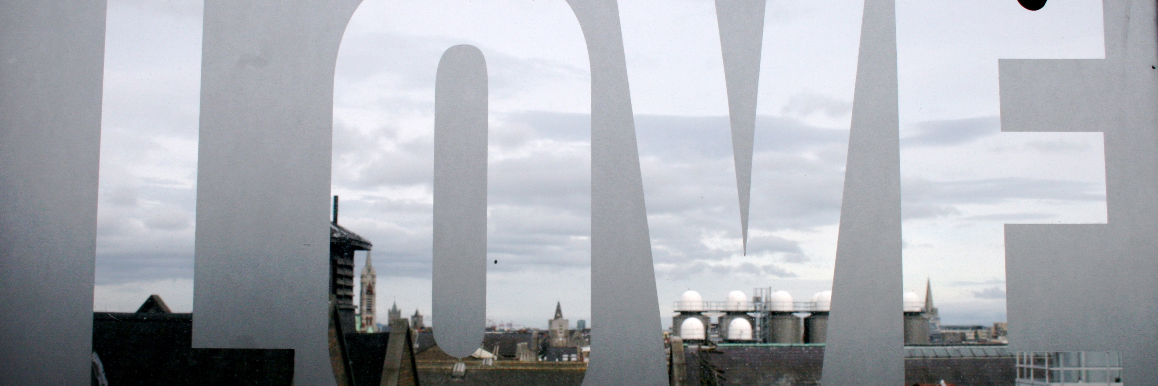 Learning to Love Myself With Chronic Pain, Illness skyline with word 'love' over it