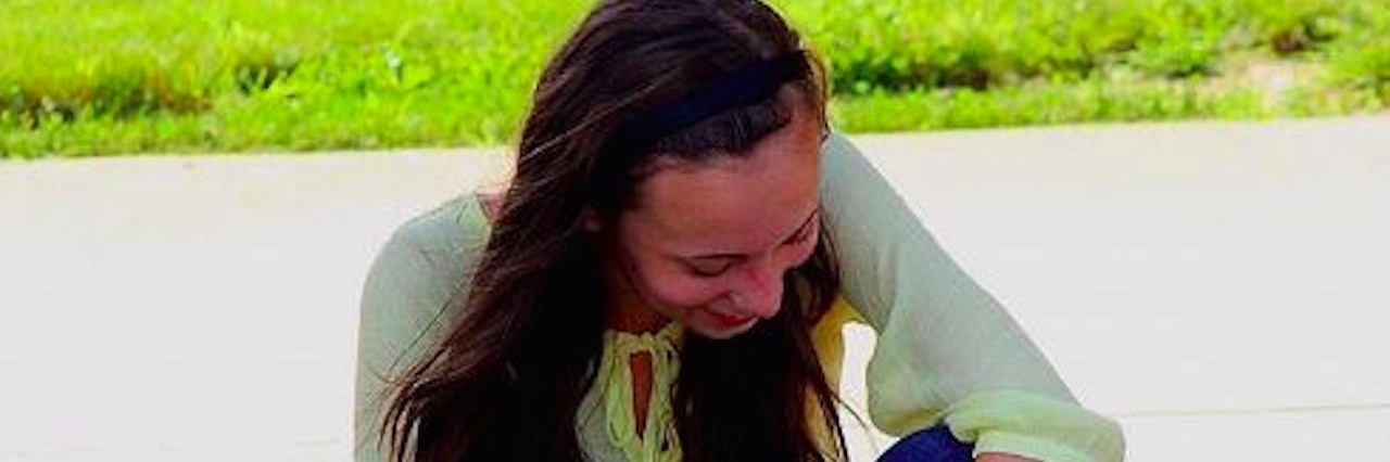 Adjusting to Life After Ehlers-Danlos Syndrome Diagnosis girl sitting on ground