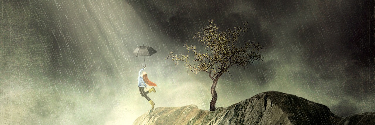 How I Found Hope While Struggling With Migraines Girl on mountain dances in the rain, ray of sunshine breaking through the clouds.