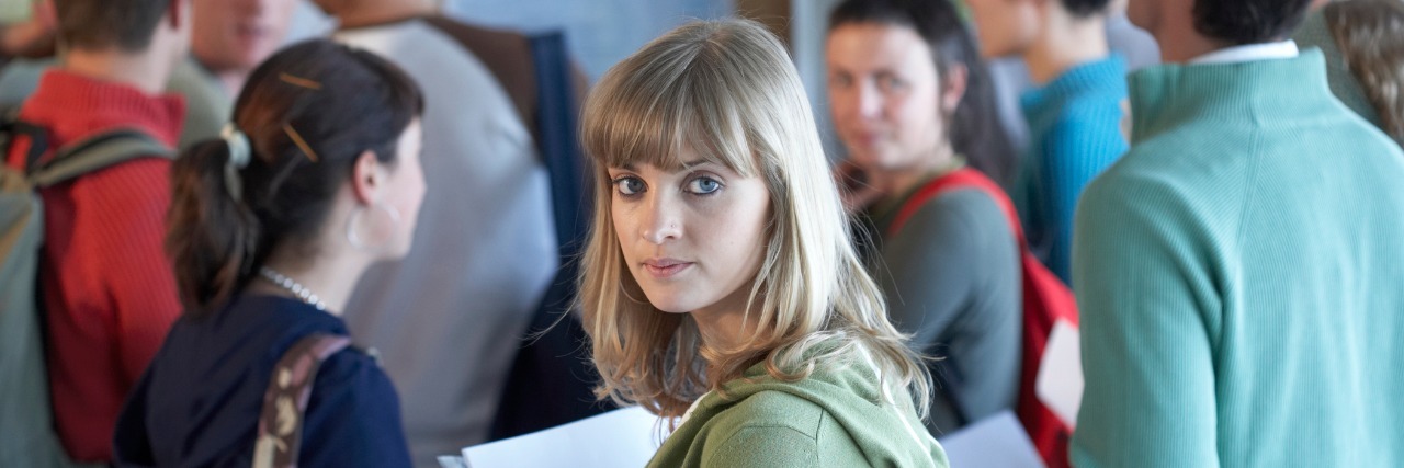 6 Tips for Your First Year of College With a Chronic Illness Young woman in college.