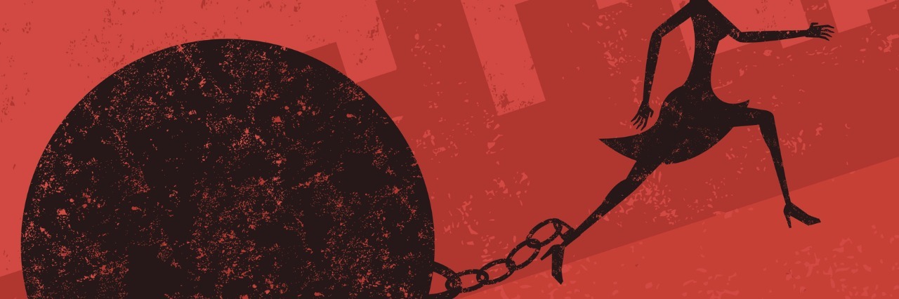 Why Chronic Illness Feels Like a Ball and Chain Shackled to My Ankle Woman with ball and chain shackled to her ankle
