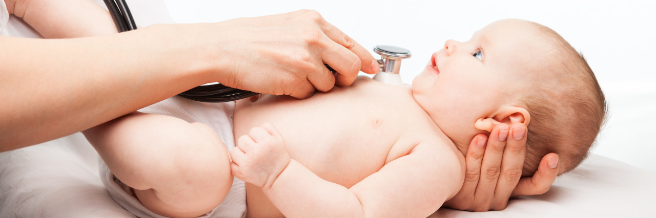 Responding to Doctors Who Had Low Expectations About My Blindness Doctor examining baby.