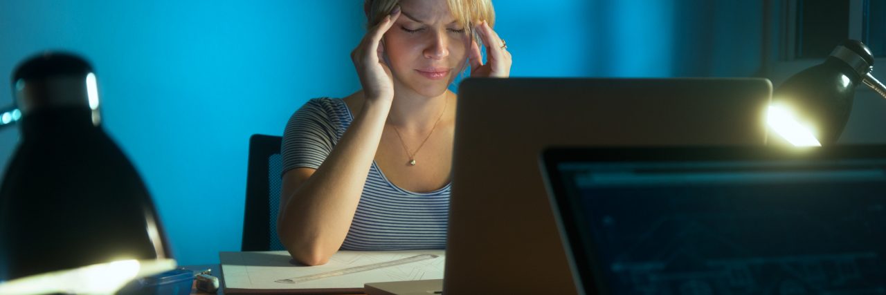 My Epilepsy Is Like a Computer Glitch Woman dealing with computer glitch.