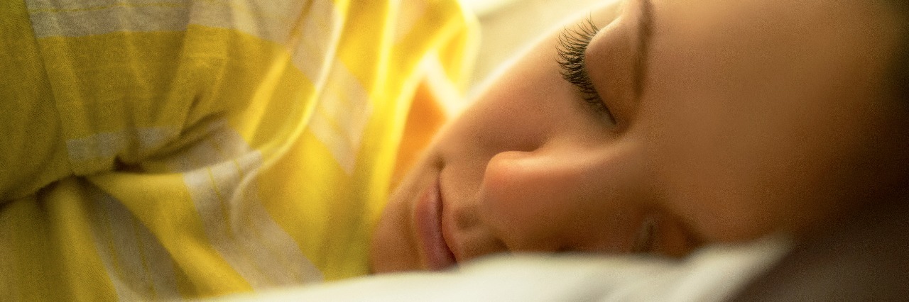 When My Brain Takes a Break 'Normalizing' My Chronic Pain Young woman in bed.