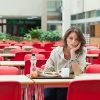 Woman eating lunch alone.