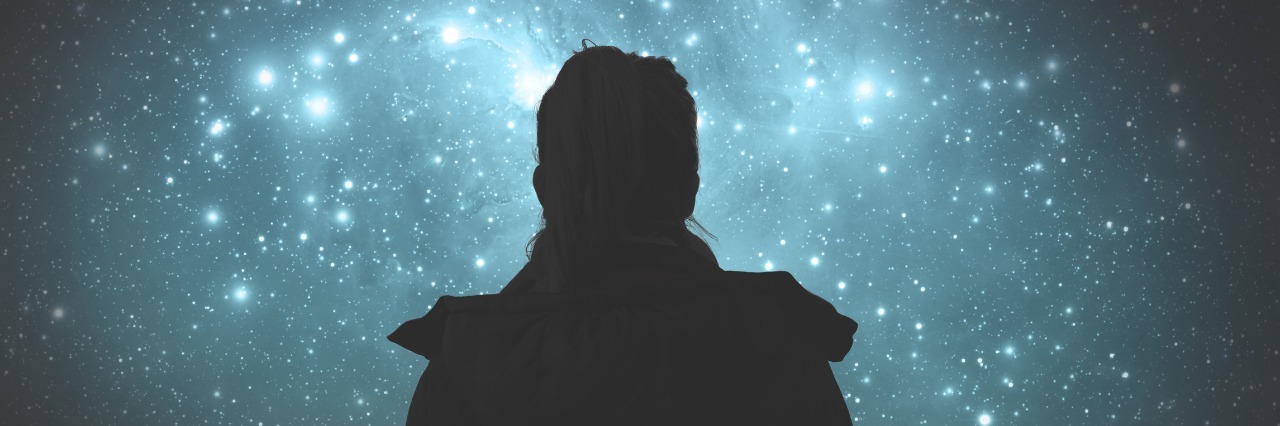 Difficulty of Finding Purpose, Place in the World With Chronic Illness silhouette of woman looking at starry sky