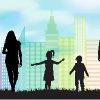 Silhouettes of man, woman, boy and girl on grass in front of city buildings