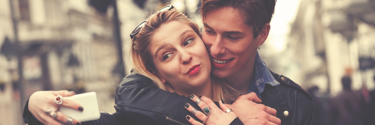 Dating With Inflammatory Bowel Disease Dating man and woman taking selfie.