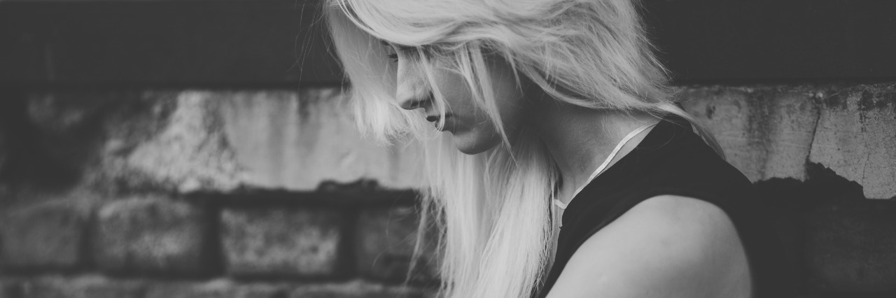 Eating Disorders Have Nothing to Do With 'Dedication' Sad Hipster Woman Outdoors