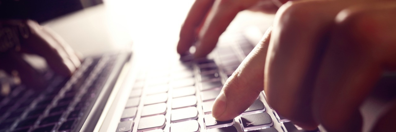 Why I Share About My Life After My Heart-Lung Transplant Hands typing on laptop keyboard