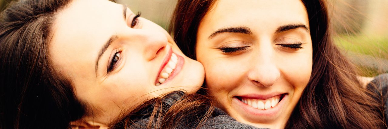 10 Ways to Support a Friend Whose Loved One Struggles With Addiction Girl hugging her best friend. In the park