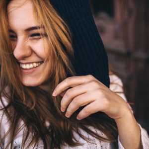 Teen girl laughing.