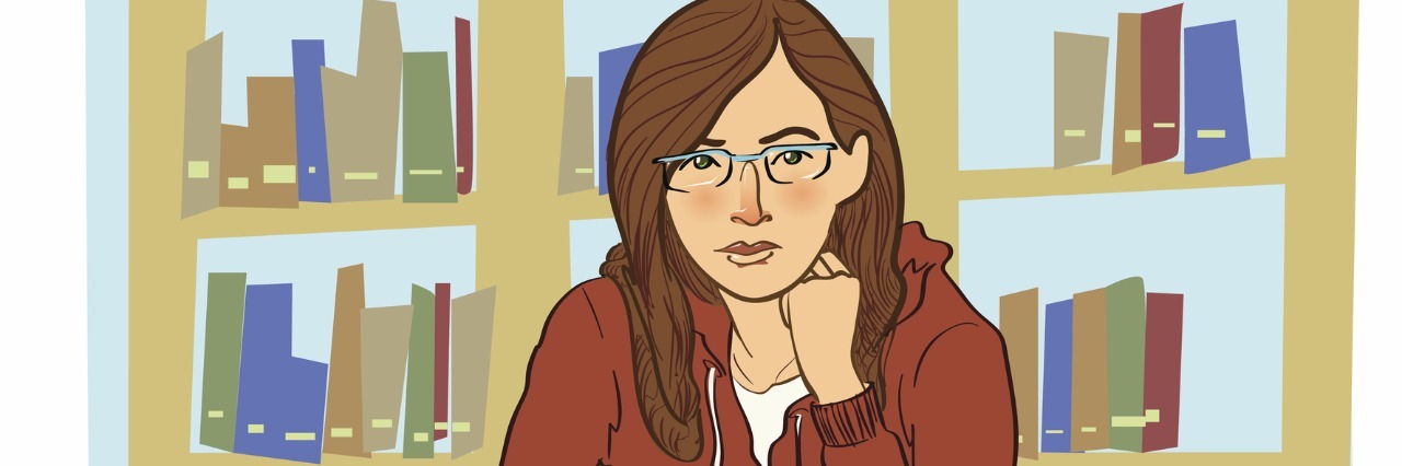 Balancing School And Anxiety Female university student sitting in library working on assignment