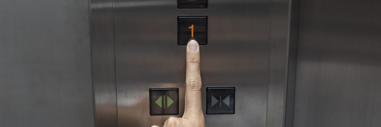 To the Guy on the Elevator: Not Everyone Can Take the Stairs Woman's hand pressing number "one" on an elevator.