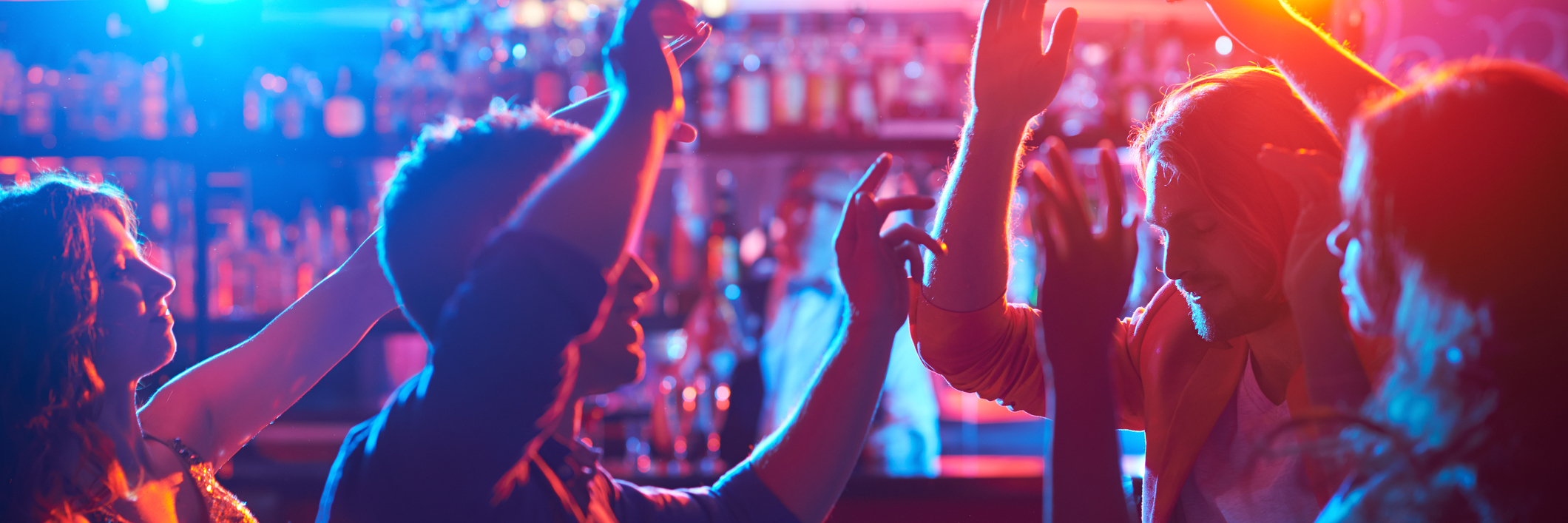 How I Used Partying and Drugs to Cope With Mania friends partying at a bar