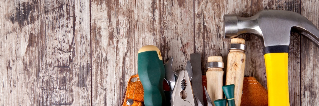 What to Keep in Your Bipolar Disorder 'Toolbox' set of tools in tool box on a wooden background