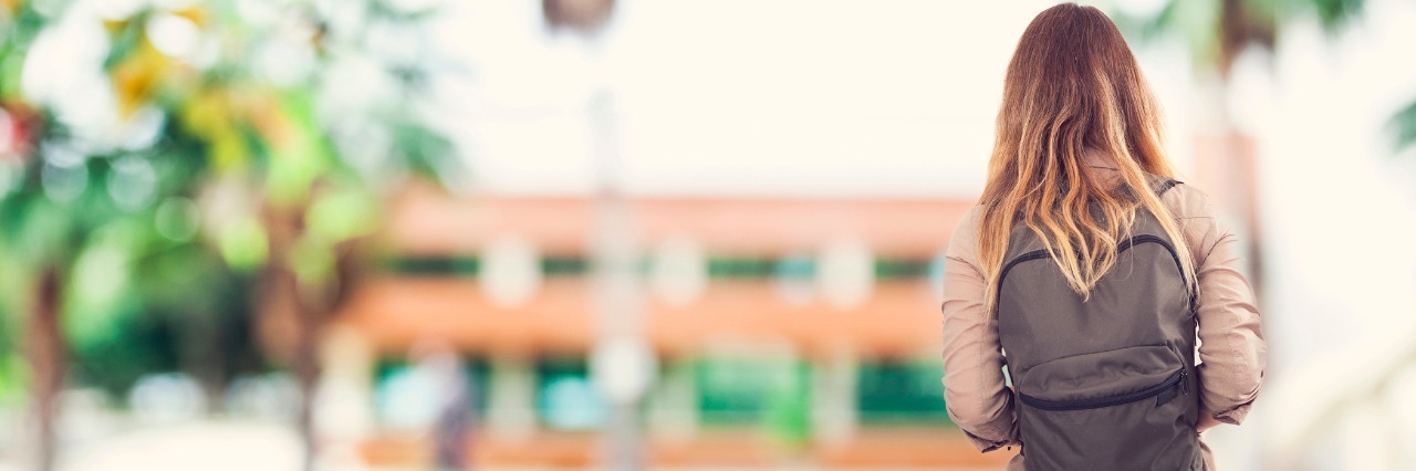 What I Wish I Could Tell My Teenage Self Who Just Got Dysautonomia Student girl at school wearing backpack