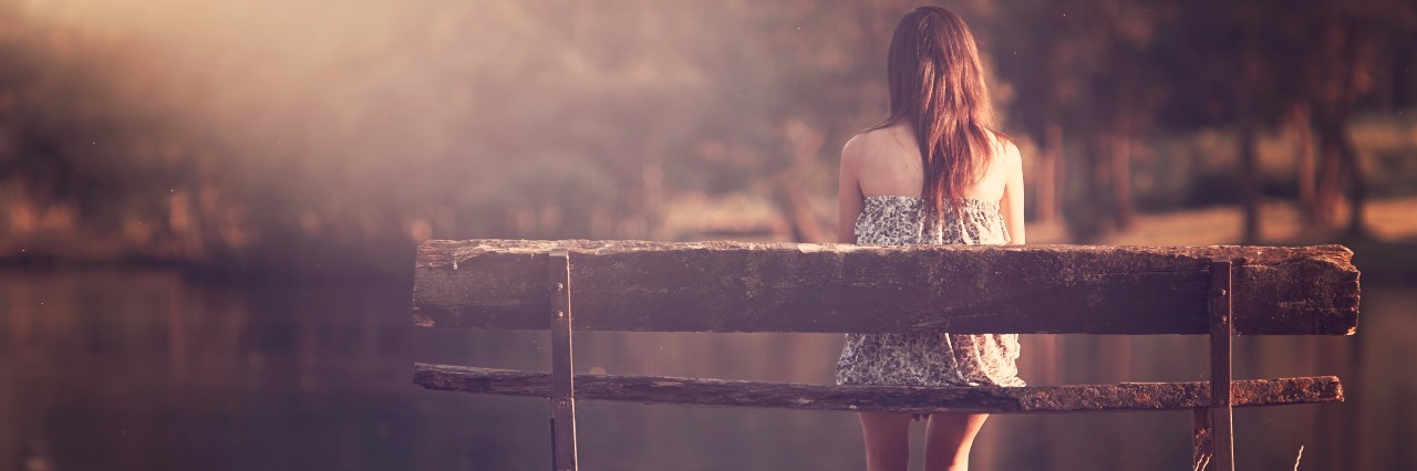 How Friendships Changed When I Became Sick Girl sitting in a bench