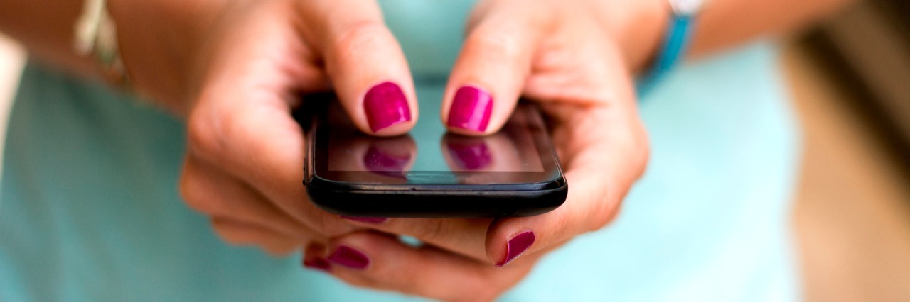 When Posting About Your Illness on Social Media Annoys Other People Girl holding smart phone outside