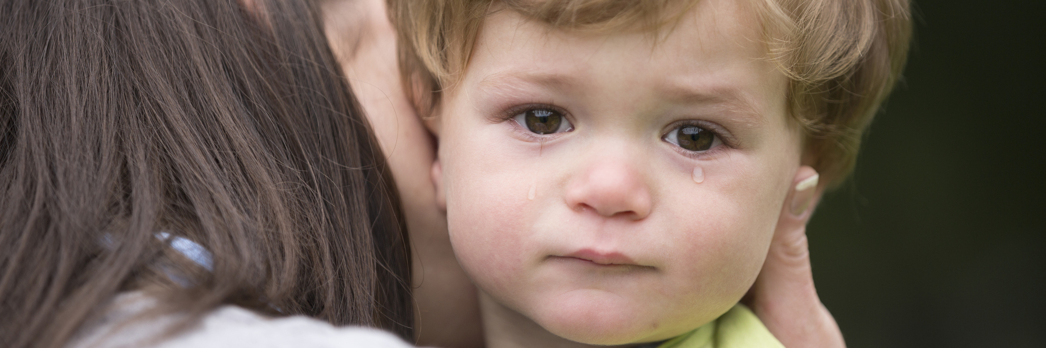Parents: Respect the Dignity of Your Children With Disabilities Sad little boy being hugged by his mother.