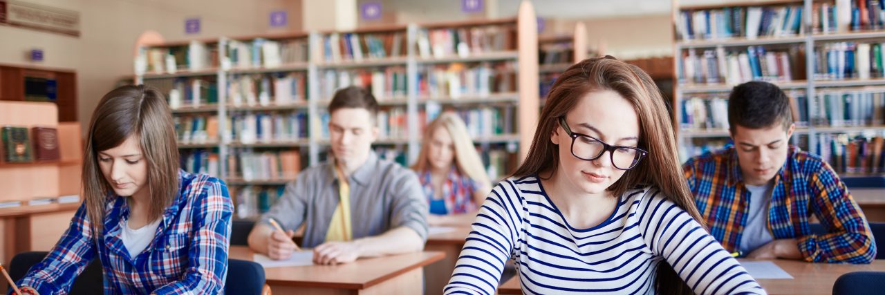 Letter to Students About People With Mental Illness Serious student writing test at college