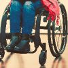 Young woman in wheelchair.