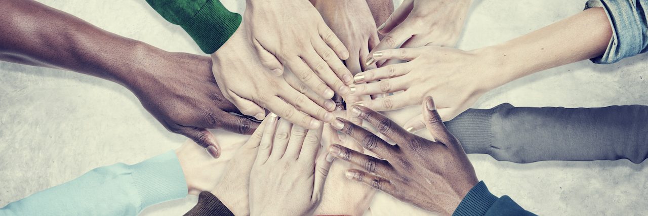 Mental Health Advocates Open Up About Self-Care hands in the middle