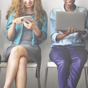 Four friends on their computers and tablets.