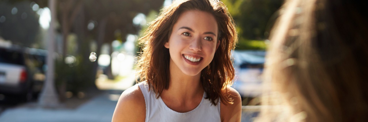 Fibromyalgia: Learning Not to Judge Others, Make Assumptions two women talking over coffee at an outdoor cafe