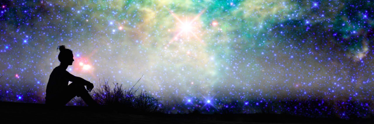 The Clarity My Autism Diagnosis Has Brought Me Silhouette of a woman sitting outside, starry night background