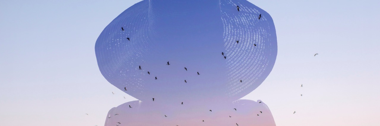 Anxiety and Depression: Sharing My Story Is a Step Toward Healing Silhouette of woman wearing hat, standing in front of sunset sky and mountain landscape with birds flying