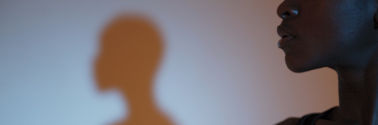 Why I’m Glad I Was Diagnosed With Lupus While I Was Single woman and her shadow