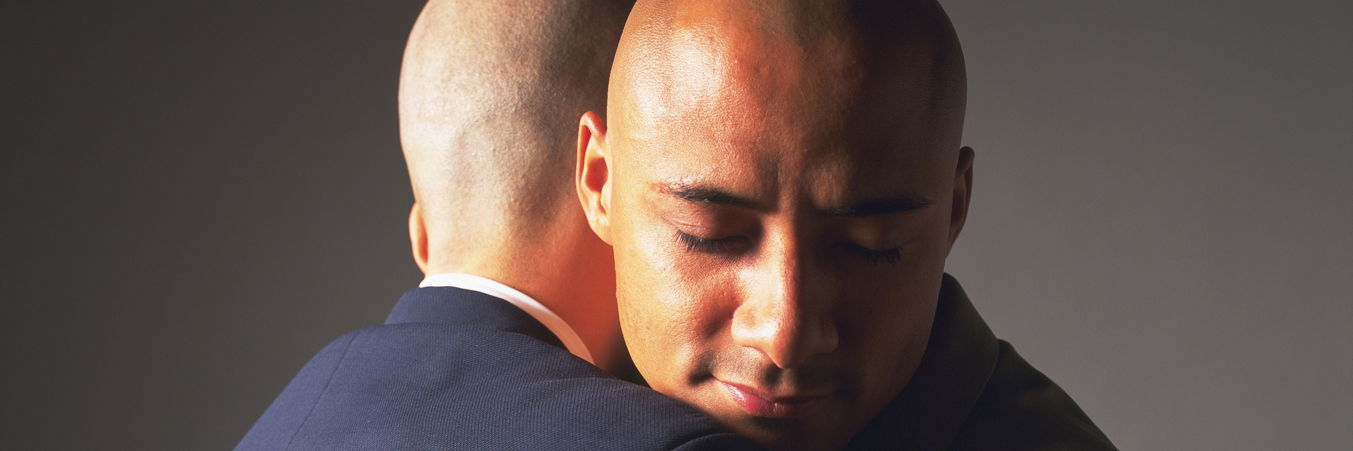 How I've Built a Circle of Friends, Despite Social Anxiety two men hugging