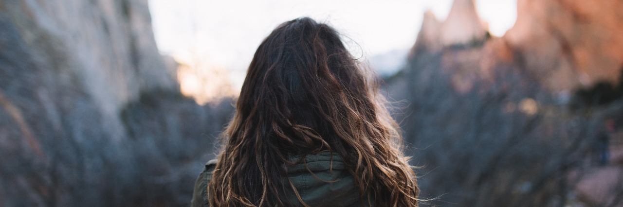 The Night I Realized I Am Stronger Than My Anxiety woman in mountains looking into distance