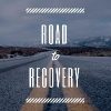 text saying 'road to recovery' over a picture of a road