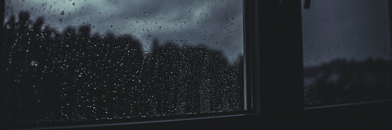 I Really Don't Want to Feel Depressed rain outside a window