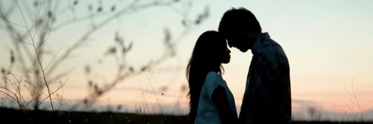 A Thank You to Caregivers Who May Not Even Know They're Caregivers man and woman in a field