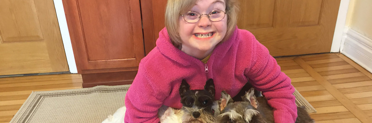 Entrepreneur With Down Syndrome Starts Gracie's Doggie Delights Gracie with her schnauzers.